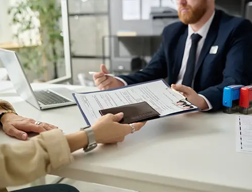 Person checking the official status of an authorized Canadian immigration representative online.