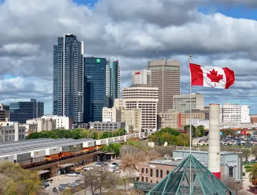 Skilled worker planning a permanent residence pathway through Manitoba